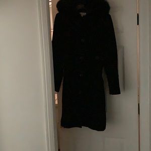 Black coat with fur trimmed hood.